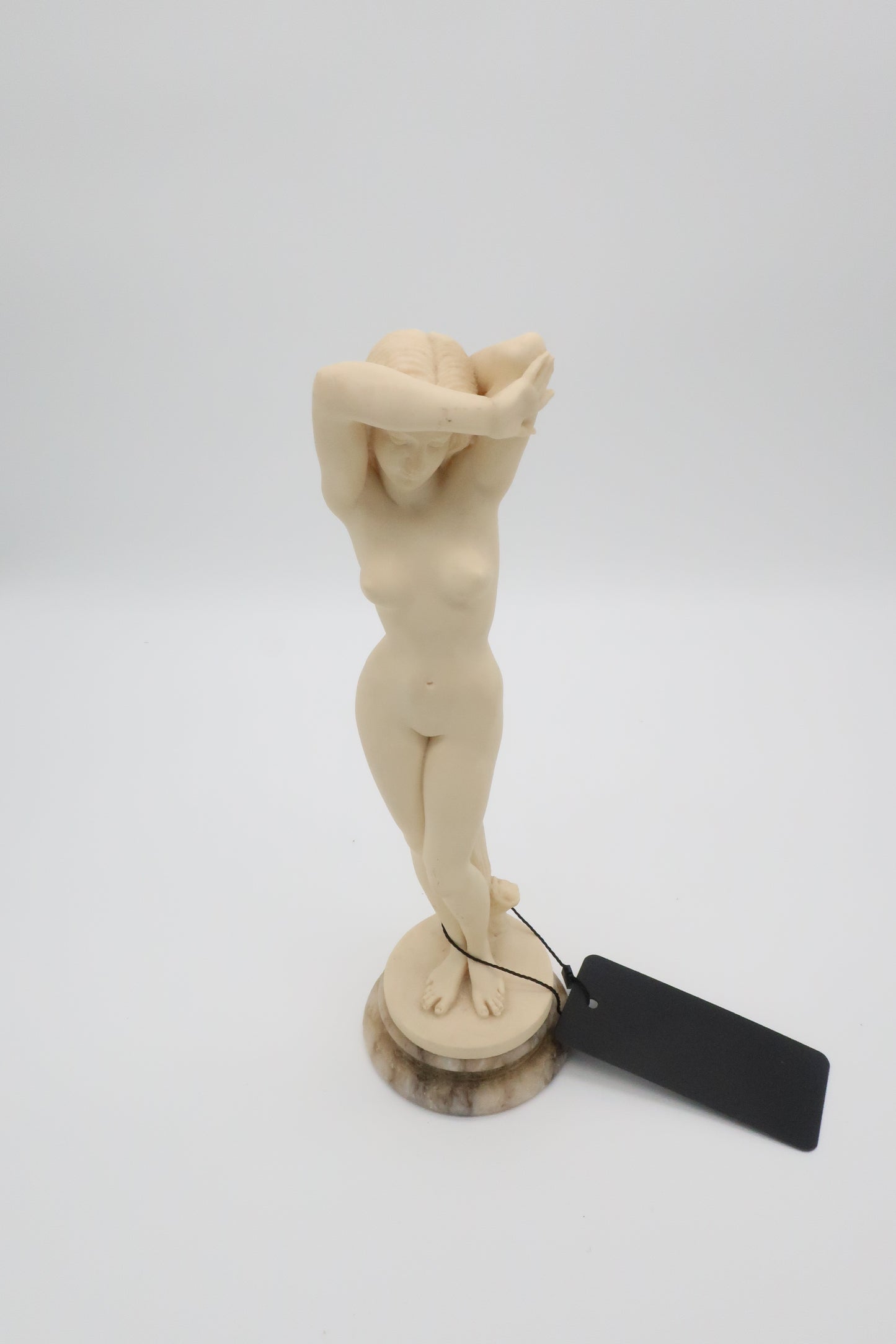 Nude Sculpture On Marble Base